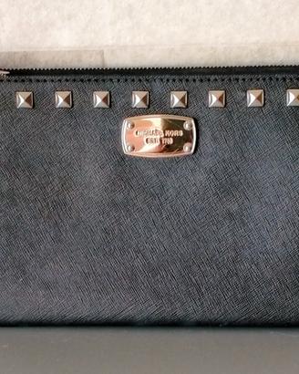 Pochette Michael kors nera con borchie