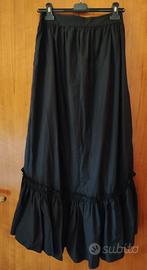 Gonna lunga nera Motivi