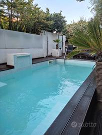 Appartamenti con Giardino e Piscina a Oristano