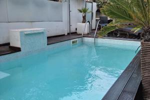 Appartamenti con Giardino e Piscina a Oristano
