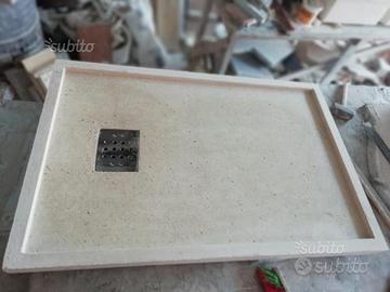 Lavandini piatti doccia e pietre mosaico