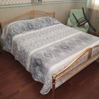 Letto matrimoniale di ottone.
