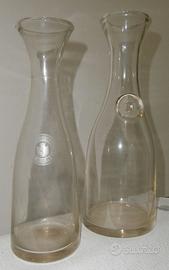 Caraffe antiche in vetro e in ceramicha robusta