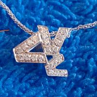 Collana Versace in oro bianco 18k e diamanti 