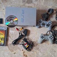 playstation 2 con 2 controller,memory e 2 giochi