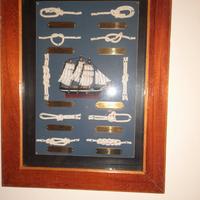 quadro con nodi e veliero in legno in rilievo