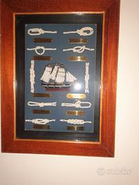 quadro con nodi e veliero in legno in rilievo