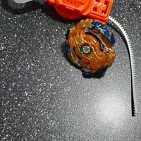 Trottola beyblade con lanciatore