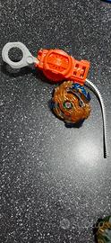 Trottola beyblade con lanciatore