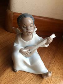 Porcellana LLadrò- Angelo con il Flauto