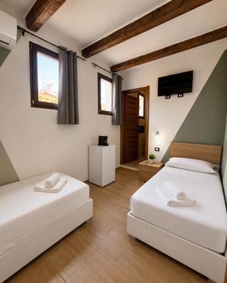 Camera con letti singoli con bagno privato