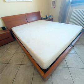 Letto contenitore con testata legno ciliegio