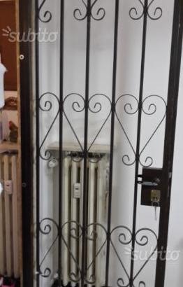 Porta - cancello in ferro battuto