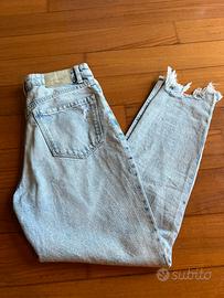 Jeans mom vita alta strappati chiari