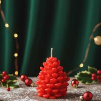 candela a forma di pigna