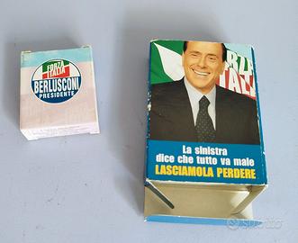 carte da gioco e profumo della liberta Berlusconi