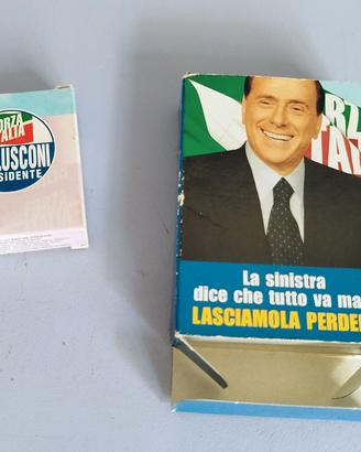carte da gioco e profumo della liberta Berlusconi