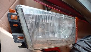 Faro e freccia anteriore sinistro Carello Alfa 75