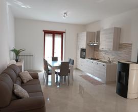 Casa con giardino