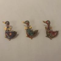 Spille decorative vintage a forma anatroccolo