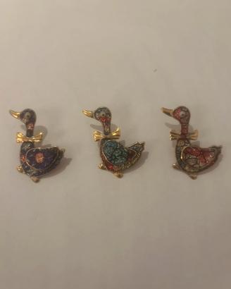 Spille decorative vintage a forma anatroccolo