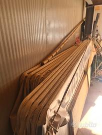 Tende  parasole e impermeabili bianche