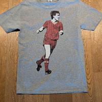 Maglietta e oggetti da collezione con Kenny Dalgli