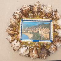 Cornice portafoto decorata con conchiglie