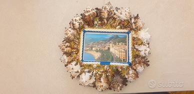 Cornice portafoto decorata con conchiglie