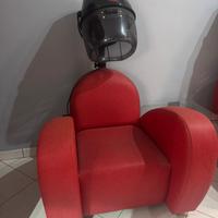 Poltrone di design rosse con casco parrucchiera