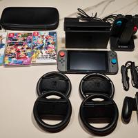 Nintendo Switch 1 con accessori e giochi