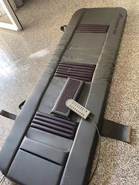 Lettino massaggi vibrante con telecomando.