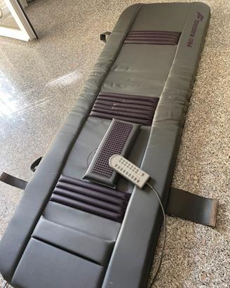 Lettino massaggi vibrante con telecomando.