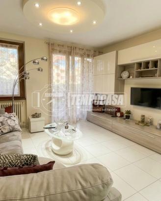 ELEGANTE APPARTAMENTO CON GIARDINO PRIVATO