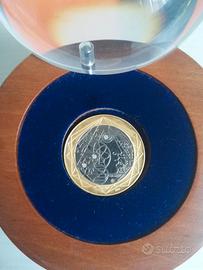 Medaglia Titania in oro, titanio e diamanti