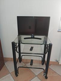 Mobile porta tv in metallo nero e vetro. 
