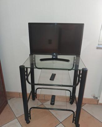 Mobile porta tv in metallo nero e vetro. 