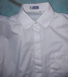 Camicia bianca .  Reception/Sala/Bar. Alberghiero
