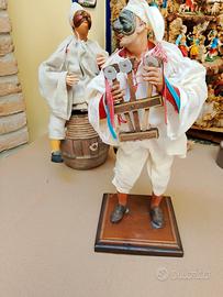 Pulcinella suonatore.