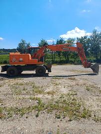 Escavatore gommato Doosan dx 140w