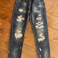 Jeans strappati