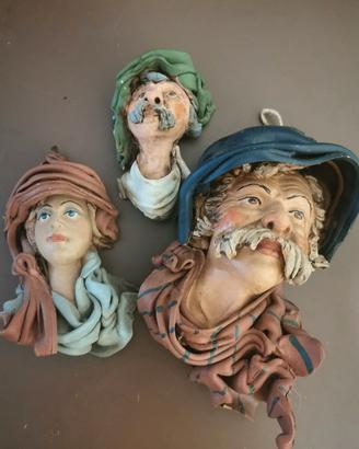 maschere terracotta Monreale Sicilia