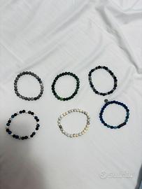 Braccialetti elastici con palline e pietre