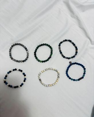 Braccialetti elastici con palline e pietre