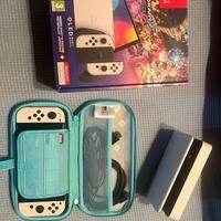 Nintendo switch OLED + Mario kart deluxe 8 ecc