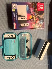 Nintendo switch OLED + Mario kart deluxe 8 ecc