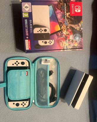 Nintendo switch OLED + Mario kart deluxe 8 ecc