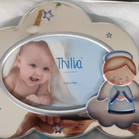 cornice argento nuova marca thilia con angioletto