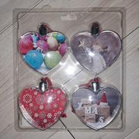 Quattro decorazioni per l'albero di natale