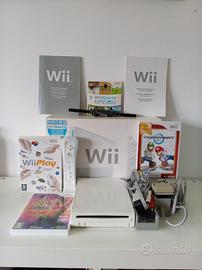 nintendo Wii con scatola telecomando,cavi egiochi 